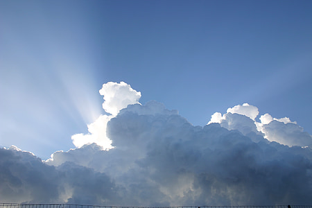 white clouds and crepuscular rays thumbnail