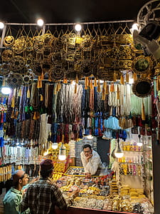 Three Men Surrounded With Jewelries during Nighttime thumbnail