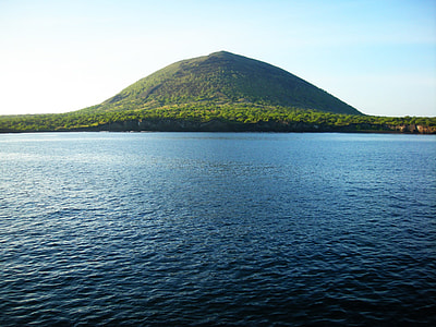 mountain in front of calm body of water thumbnail