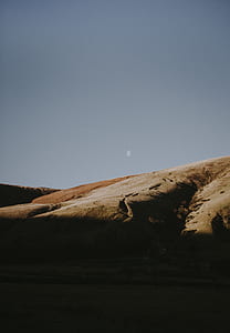 brown sand mountain under clear sky thumbnail