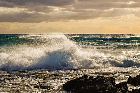 seawaves and rock formation thumbnail