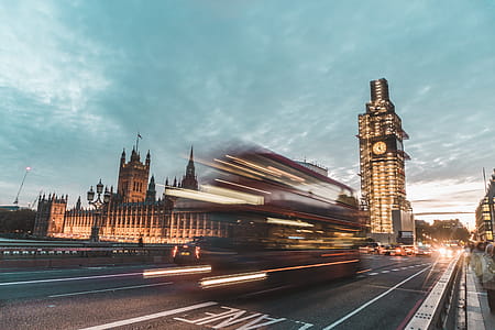 Time-lapse Photography of Vehicles Passing Near Building thumbnail