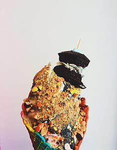 Ice Cream on Cone With Crushed Peanuts and Brownies thumbnail
