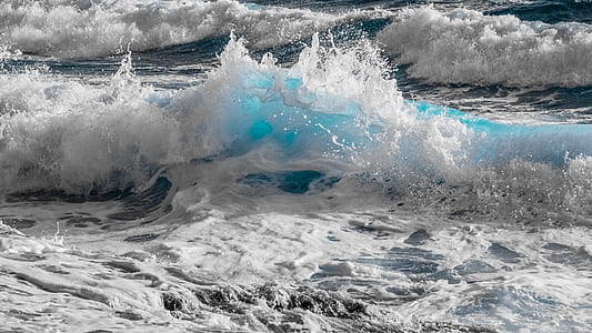 shallow photography of water waves thumbnail