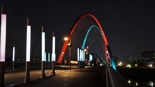 photo of suspension bridge during nighttime thumbnail
