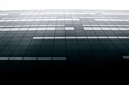 bottom view photography of curtain wall building thumbnail