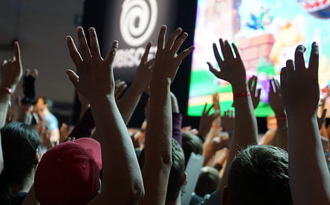 crowd raising their hands thumbnail
