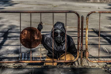 Person Wearing Black Hoodie and Mask thumbnail