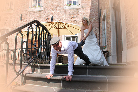 woman holding mans foot outdoors thumbnail