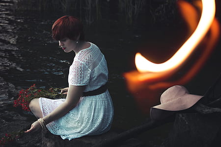 woman in white knitted dress thumbnail