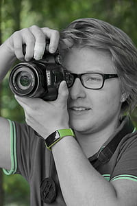 selective focus of person taking photo thumbnail