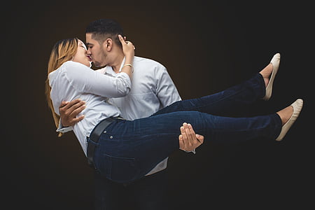 man carrying woman white kissing thumbnail