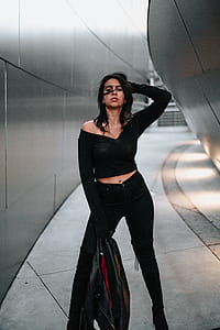 woman standing inside the building thumbnail