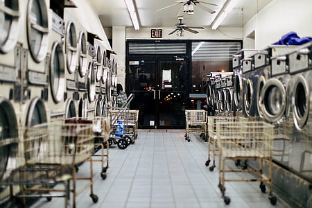 silver front-load washing machines in front carts thumbnail
