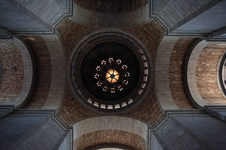 low angle photo of brown chandelier inside structure thumbnail