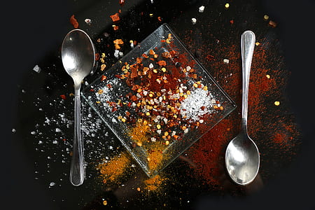 two silver spoons with spices thumbnail