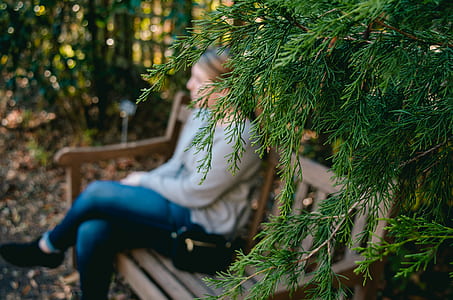 woman sitting on bench thumbnail