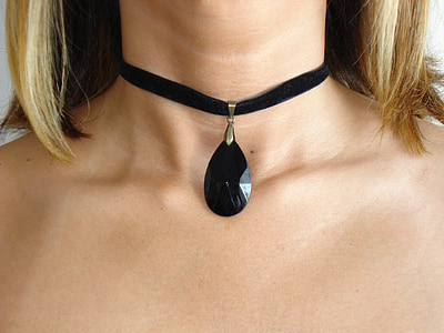woman wearing black choker necklace thumbnail