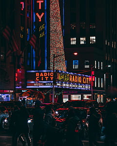 crowd outside Radio City Music Hall during nighttime thumbnail