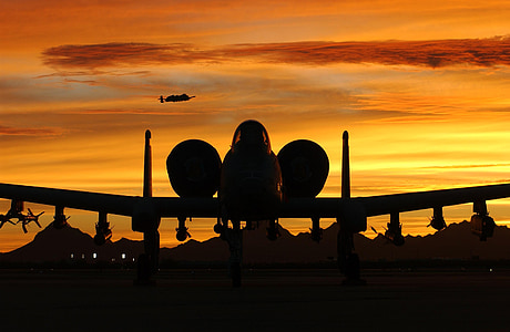 silhouette of plane during golden hour thumbnail