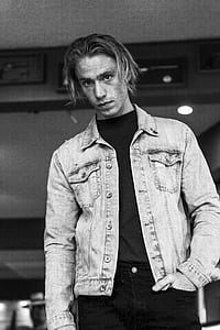 man in denim button-up jacket thumbnail