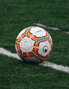 white and orange Uhilsport soccer ball thumbnail