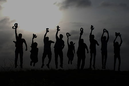 silhouette of people jumping while instagram letters thumbnail