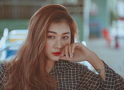 Woman Wearing White and Black Plaid Dress Shirt thumbnail