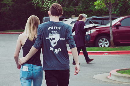 Man Wearing Gray Long-sleeved Shirt With Woman Wearing Black Camisole Top thumbnail