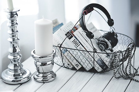 Black smartphone and headphones with various items thumbnail