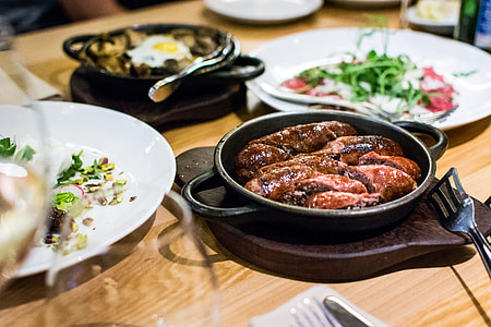Sausages in a hot pan thumbnail