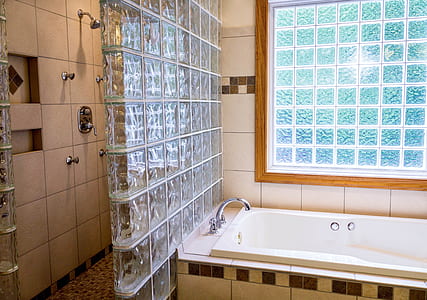 white ceramic bath tub inside bathroom thumbnail
