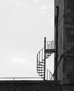 grayscale photo of building with stair beside thumbnail