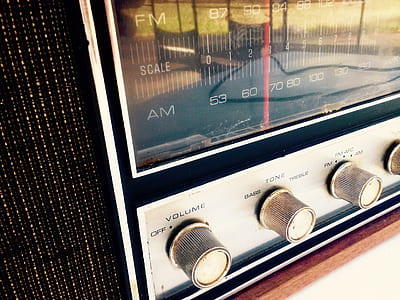 close-up photography of black and gray transistor radio thumbnail