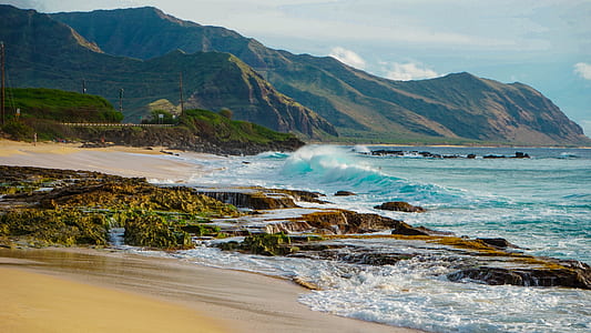 ocean waves under cloudy sky during daytime thumbnail