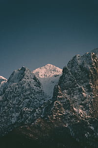 snow covered mountain during daytime thumbnail