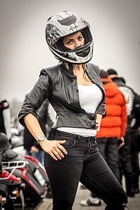 woman wearing white and black full-face helmet thumbnail