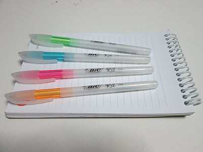 four assorted color click pens thumbnail
