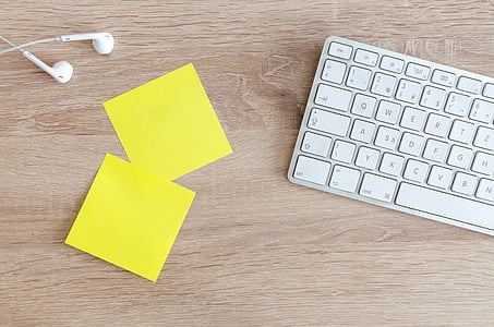 two yellow sticky notes near keyboard thumbnail