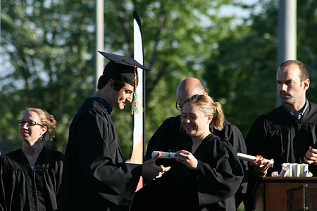 man holding certificate thumbnail
