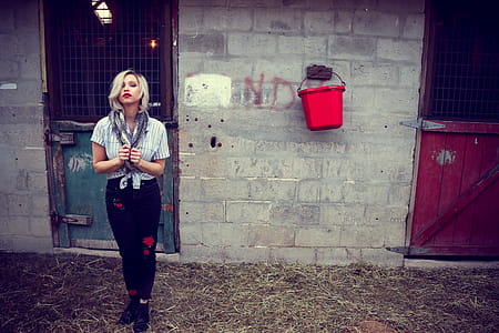 Woman in Gray Button-up Shirt and Black Pants thumbnail