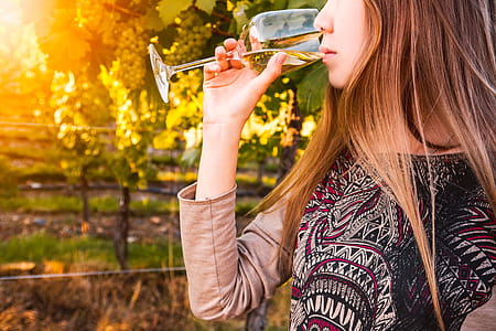 Gorgeous brunette woman having wine fun in the vineyards thumbnail