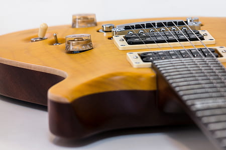 macro photography of electric guitar thumbnail