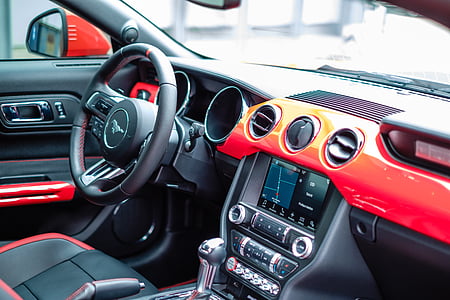 black and red Ford Mustang car dashboard during daytime thumbnail