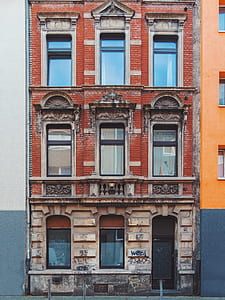 brown and beige concrete building thumbnail
