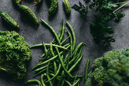 Parslel, cucumbers, green peas, and other greenery thumbnail