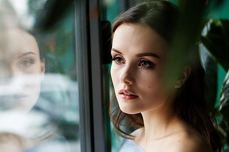 woman's reflection on mirror thumbnail