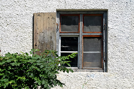 photo of grey and brown framed glass window thumbnail