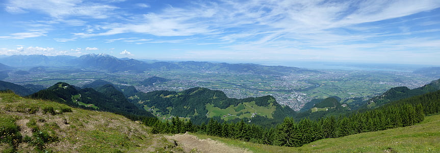 landscape photography of mountain surrounded by trees thumbnail