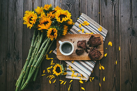 sunflowers beside white ceramic mug thumbnail